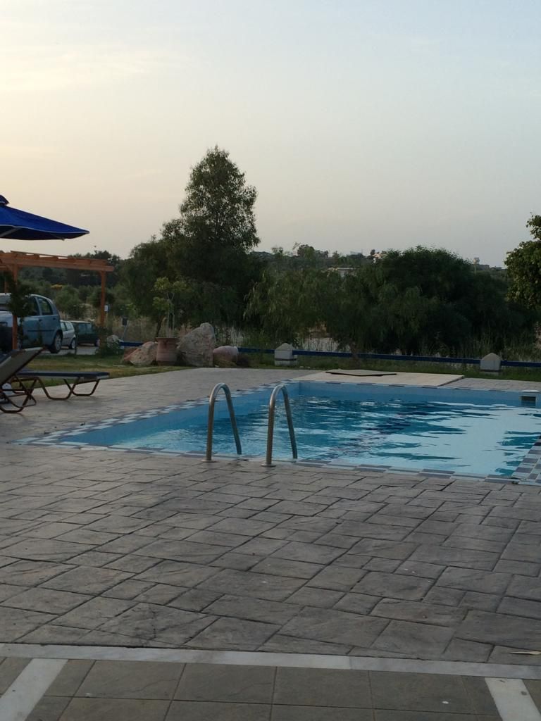 The pool and its terrace at the end of the day